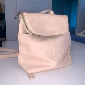 Small pink leather backpack